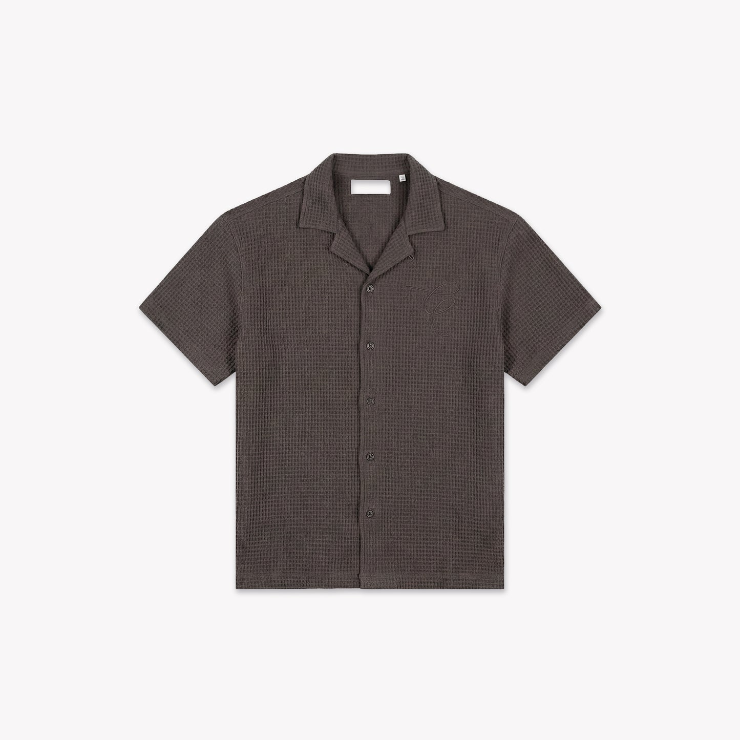 Washed brown waffle knit short-sleeve shirt with a relaxed collar and front buttons.