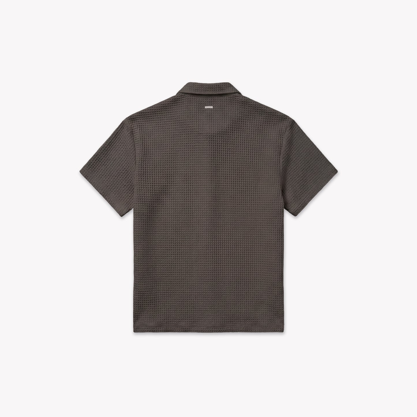 Back view of a washed brown waffle knit short-sleeve shirt with a classic collar.