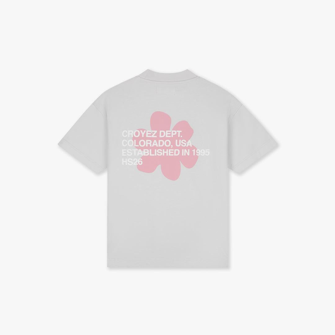 Light grey Croyez Silhouette T-shirt with pink flower graphic and "Croyez Dept. Colorado, USA. Established in 1995 HS26" text on back.