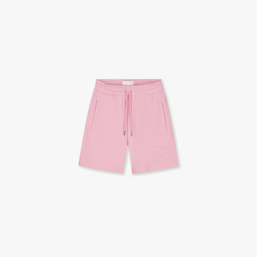 Pink Croyez Contour De La Fleur shorts with drawstring waist, side pockets, and subtle flower embroidery.
