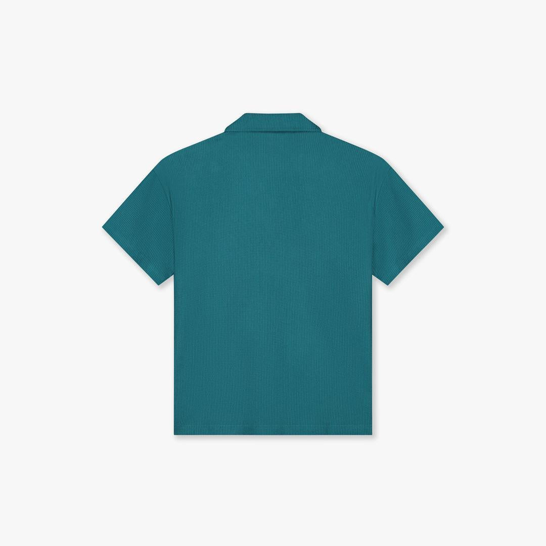 Dark teal plisse short-sleeve shirt with a ribbed texture and classic collar, back view.